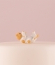 Figura de gatito blanco y naranja